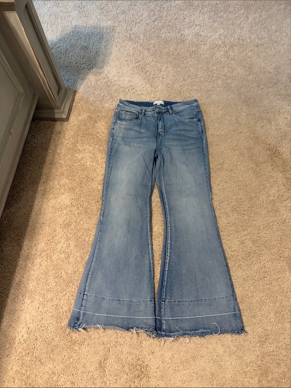 Light Wash Women's Flare Jeans with Raw Hem
